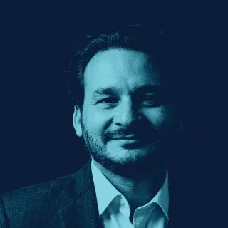 Retrato del Dr. Jeffrey Castellanos, CMO de Corpus AI.